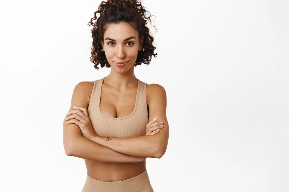 Confident woman in sports bra