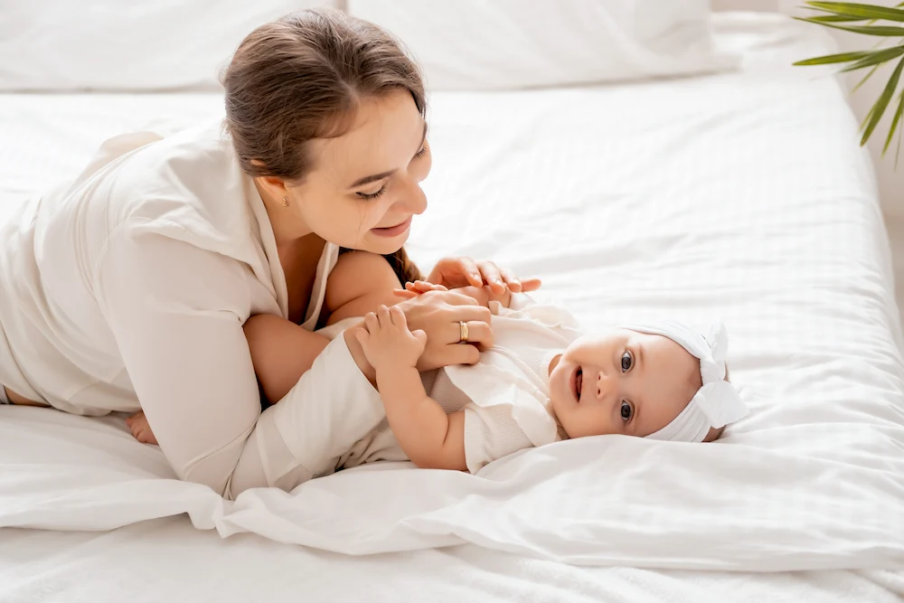 Mother playing with her small child